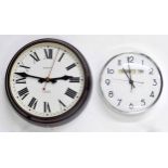 Magneta electric 12" wall dial clock with centre seconds sweep hand, within a Bakelite case; also