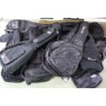 Selection of twelve various guitar gig bag and soft covers