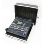 Yamaha 01V96 digital mixing console, within a heavy duty rack case