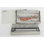 Roland Drumatix TR-606 computer controlled drum machine, with operation manual and case