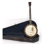 Good and unusual five string banjo, with ebony banded rosewood resonator, geometric burr walnut slot