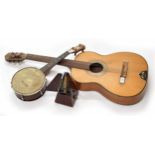 Old unnamed classical guitar; also an old ukulele banjo with plated shield inscribed Dulcetta B.S.