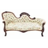 Victorian button-back upholstered chaise longue, with carved foliate frame over button back