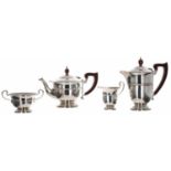 George V silver three piece tea set, half faceted with beaded rims, comprising teapot 5.5" high,