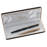 Baker's Perm-Point 9ct engine turned pencil, Birmingham 1957, 18.8gm; with a boxed Harrods pen (2)