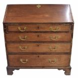 George III mahogany bureau, the fall front enclosing a fitted interior, over four long graduated