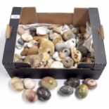 Collection of polished onyx eggs; together with a collection of seashells, coastal pebbles etc.