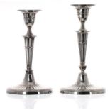 Two similar Victorian oval fluted silver candlesticks, maker William Hutton & Sons, London 1887