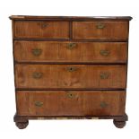 Provincial 18th century walnut veneered chest of drawers, the cross banded moulded top over two