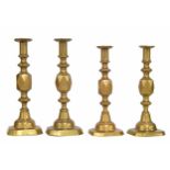 Pair of Victorian 'The King of Diamonds' brass candlesticks, with wax ejectors, stamped to the