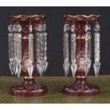 Pair of Victorian Bohemian cranberry glass lustres, with floral gilt overlaid scroll decoration,