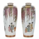 Pair of Japanese Satsuma pottery vases, finely decorated with figures under Wisteria, signature mark