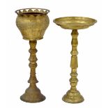 Decorative engraved brass jardinière stand, raised on central circular support, 9" diameter top,