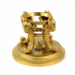 French gilt metal ink/desk stand base, cast with four masked scroll feet on a circular base, by and