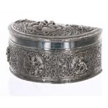 Indian/Burmese silver repousse decorated crescent box, the hinged cover with seated figures and