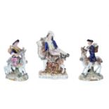 Pair of Samson Derby porcelain figures of a gentleman and mother with baby riding goats, 5.75" high;