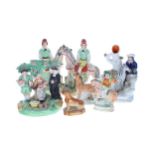 Selection of Staffordshire pottery figures, including horseback gentlemen, bocage figural group with