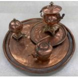 Selection of antique copper to include a twin-handled samovar with brass tap, smaller globe samovar,