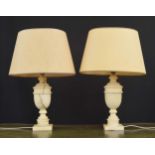 Pair of Italian veined onyx baluster table lamps with oval shades, the lamp bases 14.5" high