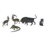 Cold painted bronze bull figure; together with a bronze lizard figure and two ibex; also a cat
