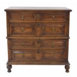 Early 18th century oak split moulded chest of drawers, the moulded top over two short and three long