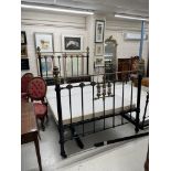 Victorian brass and iron double bed frame, with brass shell decoration, with side irons and two