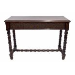 Antique carved oak serving or hall side table, with a moulded mahogany top over carved oak frieze