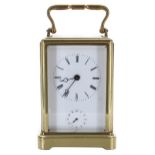 Small carriage clock timepiece with alarm sounding on a bell, within a one-piece style brass case,
