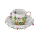 Meissen porcelain Schneeball (snowball) cup and saucer, with a floral encrusted ground and applied