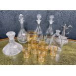 Good pair of glass decanters with hollow globe stoppers, 13" high; together with a selection of