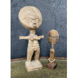 Carved wooden Ashanti tribal standing figure with bead necklace, 18" high; together with a smaller