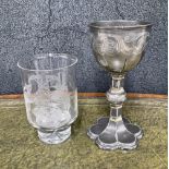 Large silver plated goblet with engraved scroll decoration, raised on a lobed petal base, 9.25"