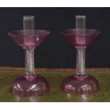 Pair of Salviati Venetian glass candlesticks, with conical ruby glass drip pans on a central clear