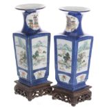 Pair of Chinese porcelain square tapering vases with circular flared rims, decorated with river