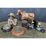 Pair of figural bookends in the manner of Bergmann, 5.5" high; together with a carved treen cattle