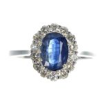 Modern 18ct white gold oval kyanite and diamond cluster ring, the kyanite 1.77ct approx, in a