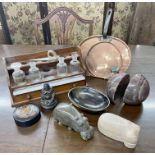 Mixed group of items; a countertop spice rack with four glass bottles, pair of marble half sphere