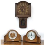 Two similar 1930s oak cased three train mantel clocks, one stamped Garrard to the back plate;