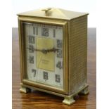 Zenith eight day gilt metal desk clock, with Arabic numerals, stamped and numbered 5215 to the back,