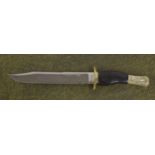 F.W. James Sheffield Bowie type knife, with horn handle and repousse horse decorated pommel, the