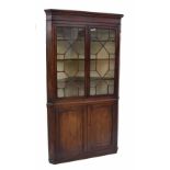 Good large Georgian mahogany standing corner cabinet, the moulded cornice over two astragal glazed
