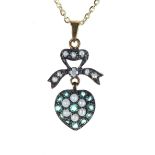 Pretty emerald, diamond and seed pearl heart shaped pendant, on a silver-gilt chain, the pendant