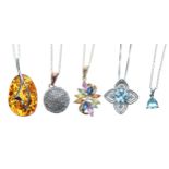 Five modern silver necklaces with stone set pendants, to include amber, apatite, topaz, mixed gems