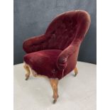 Victorian button upholstered nursery chair, the rouge velvet upholstery on carved cabriole legs