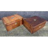 Victorian walnut writing slope with parquetry inlaid geometric bands, a hinged opening and closing a