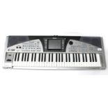 Roland E-50 Music Workstation keyboard, with stool and stand