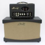 Swart Space Tone Stereo guitar amplifier head, with foot switch and tags; together with matching 2 x