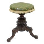 Circular piano stool supported upon foliate carved tripod curving legs, 19.5" high