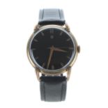 Universal gold plated gentleman's wristwatch, black dial with applied gilt hour markers and centre