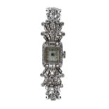 Croton Watch Co. fancy diamond set platinum lady's cocktail watch, square silvered dial with